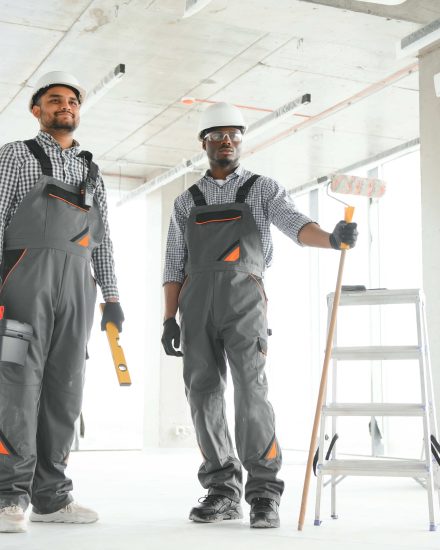 Group of multi ethnic engineer construction site worker meeting at workplace.